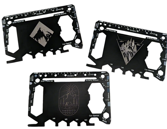 Three black multi-tool card tools with engraved silver graphics and measurements, displayed on a plain white background.